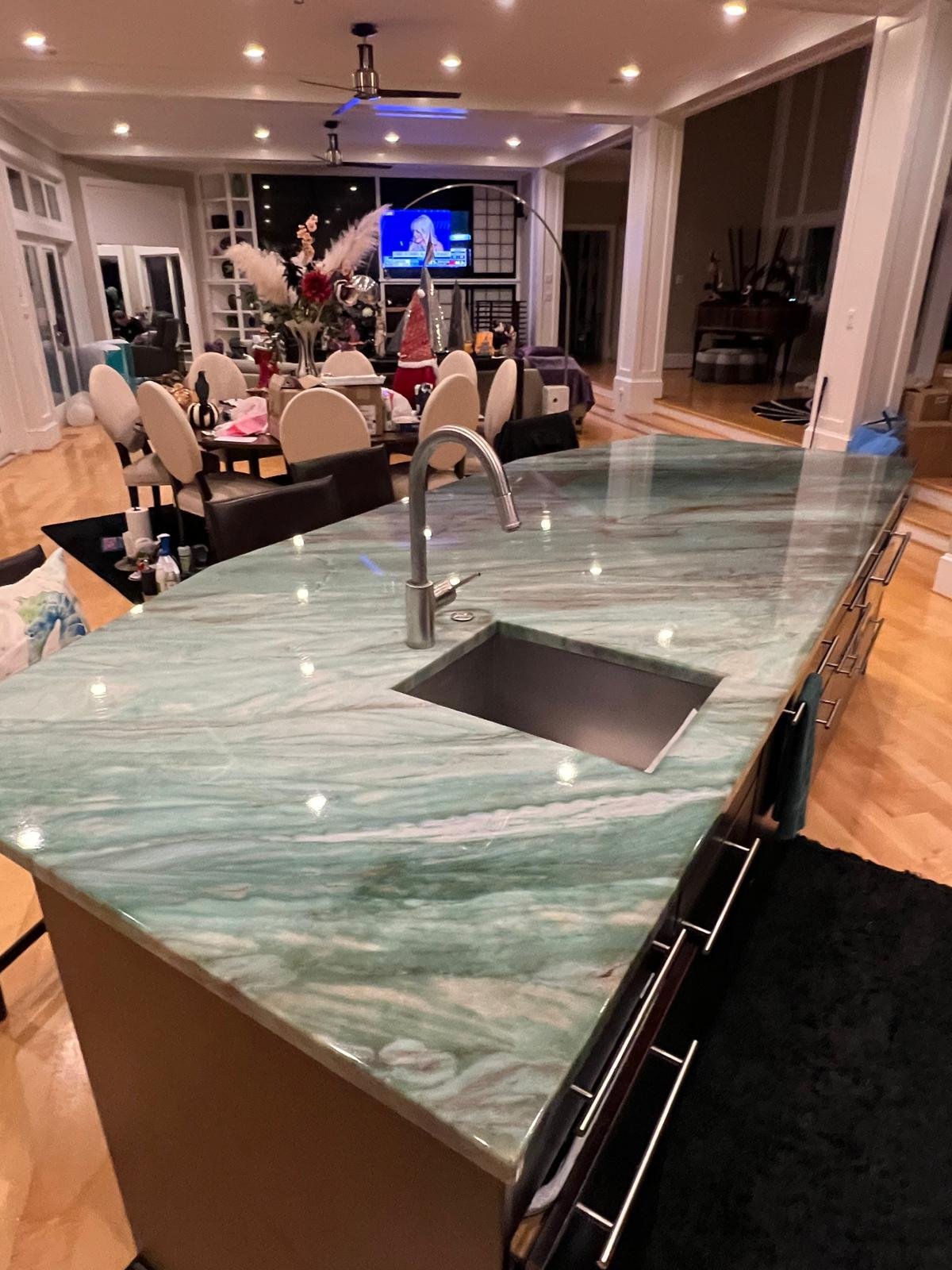 Green quartzite kitchen island — Quartz Solution, North Carolina