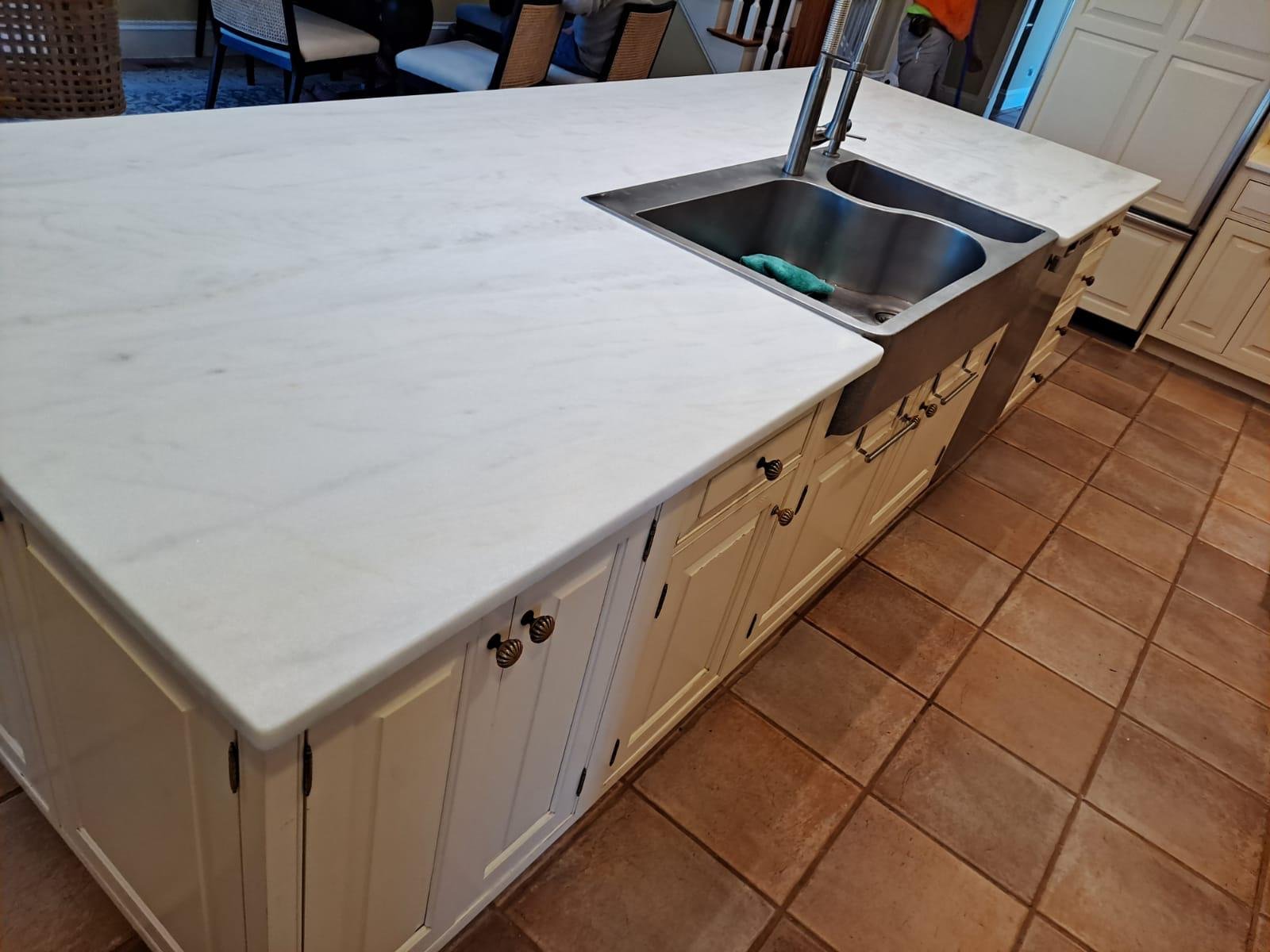 White marble kitchen island fabricated by Quartz Solution in North Carolina